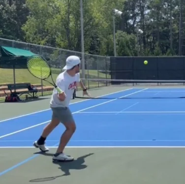 Stephen playing tennis